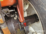 Lastartraktor New Holland 110-90