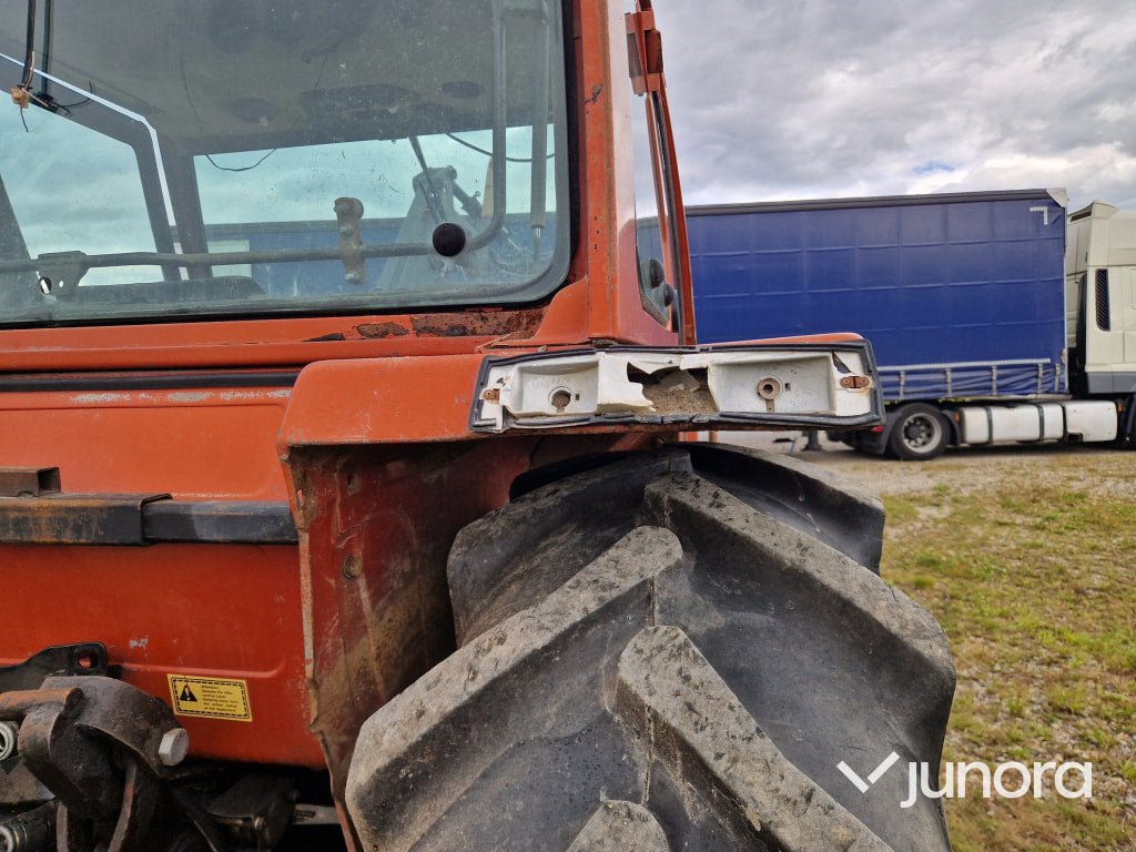 Lastartraktor New Holland 110-90