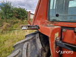 Lastartraktor New Holland 110-90