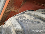 Lastartraktor New Holland 110-90