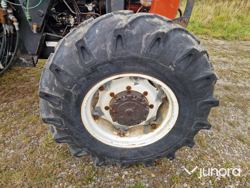 Lastartraktor New Holland 110-90