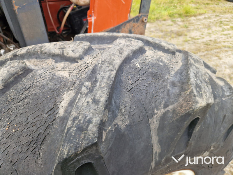 Lastartraktor New Holland 110-90