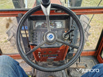 Lastartraktor New Holland 110-90