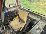 Lastartraktor New Holland 110-90