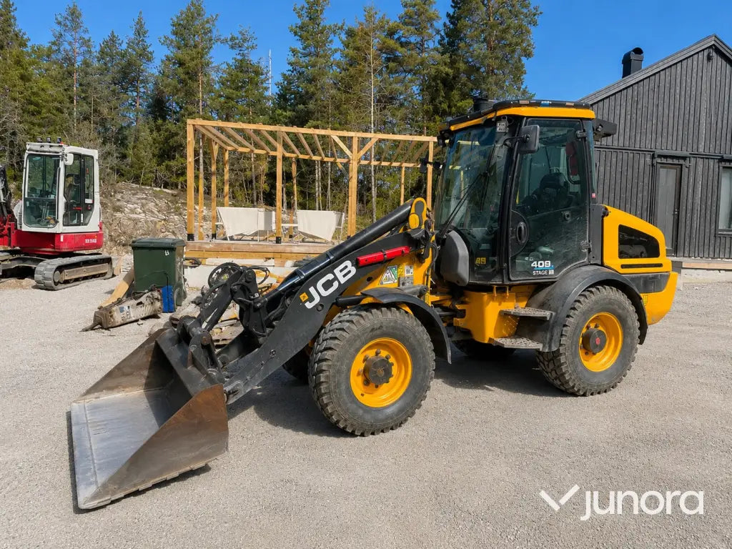 Hjullastare - JCB, 409, Nordic Edition Stage V, Med redskap