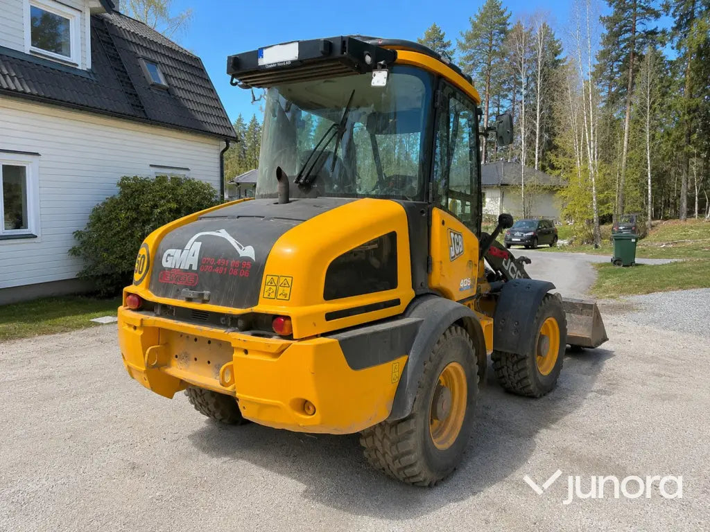Hjullastare - JCB, 409, Nordic Edition Stage V, Med redskap