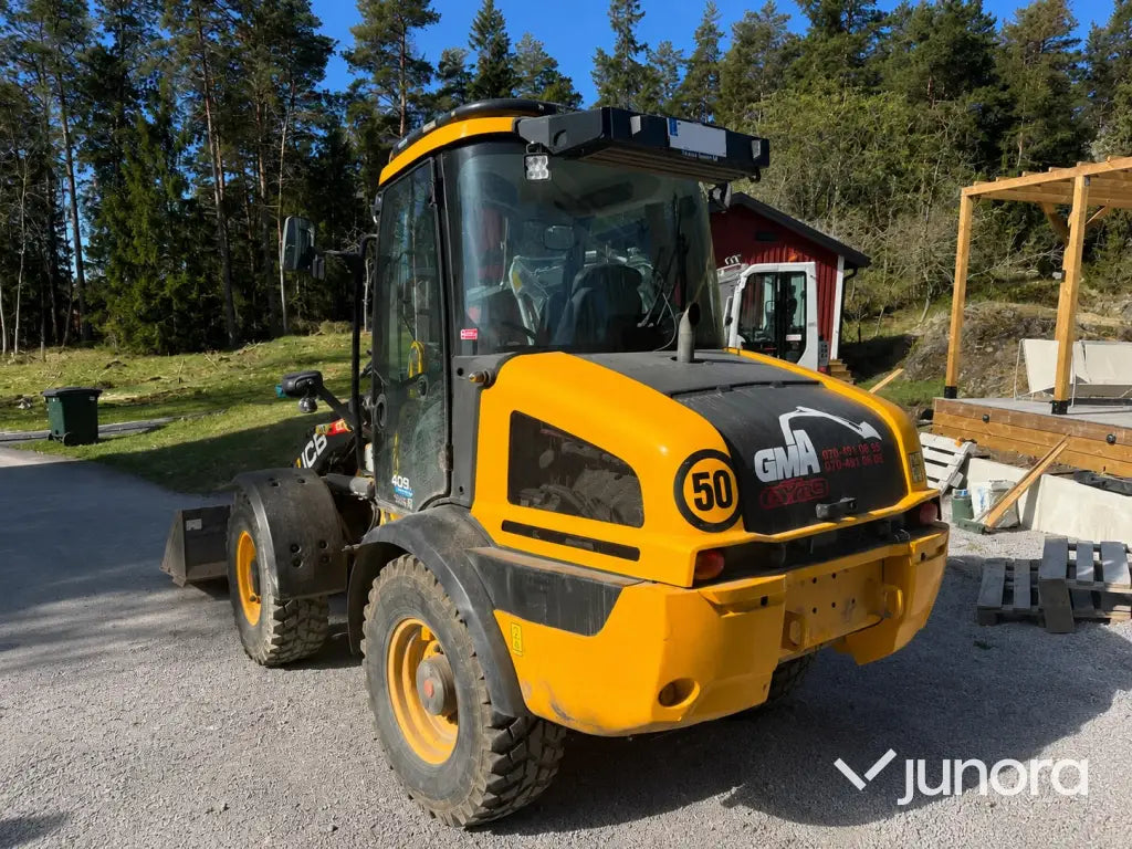 Hjullastare - JCB, 409, Nordic Edition Stage V, Med redskap