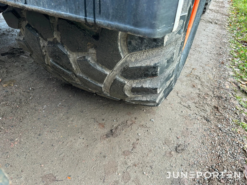Hjulgrävare Doosan DX140W med dumpervagn