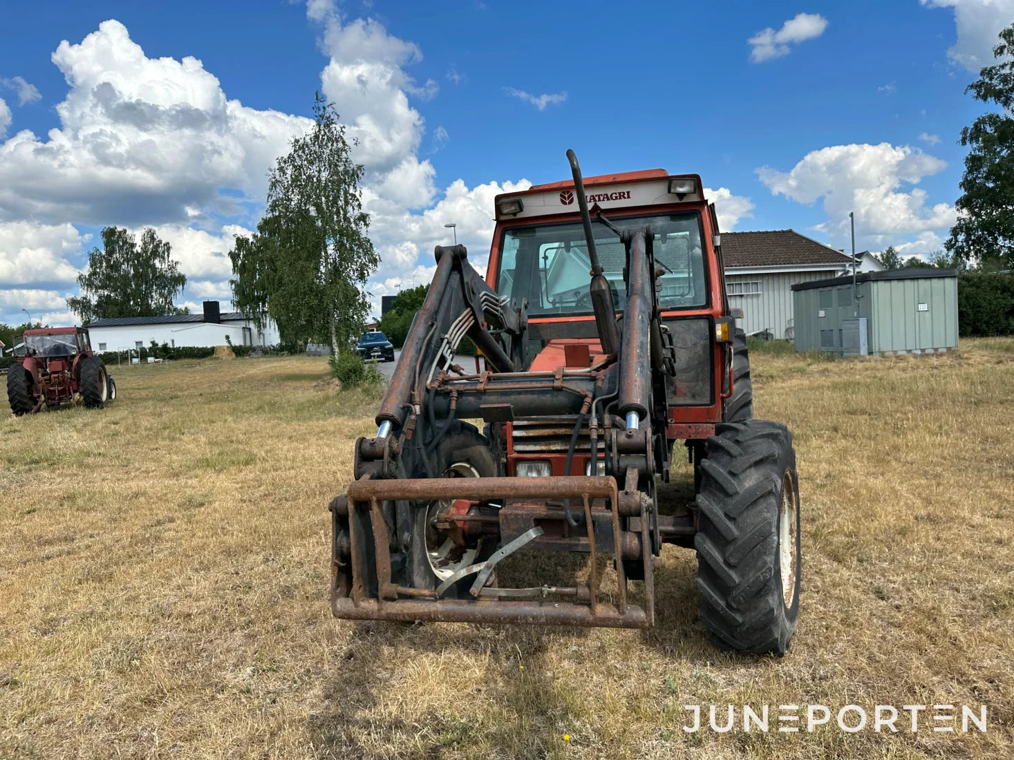 Fiat 80-90 DT med trima lastare