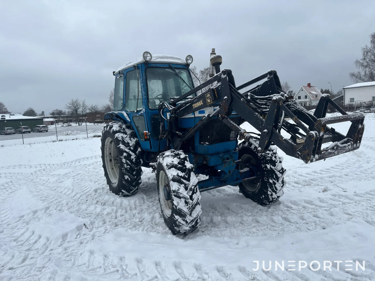 Ford 7700 med trima lastare
