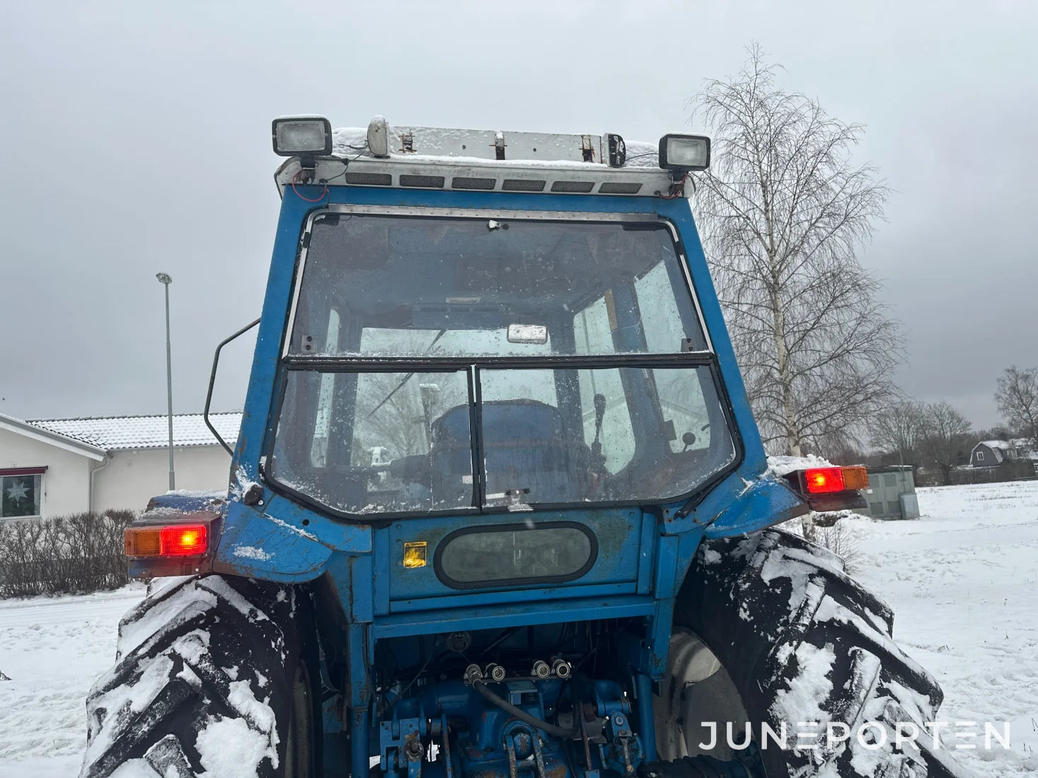Ford 7700 med trima lastare