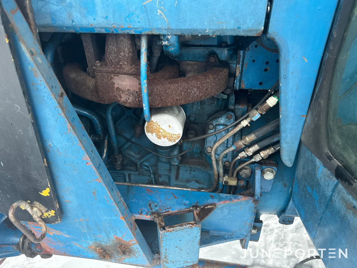 Ford 7700 med trima lastare