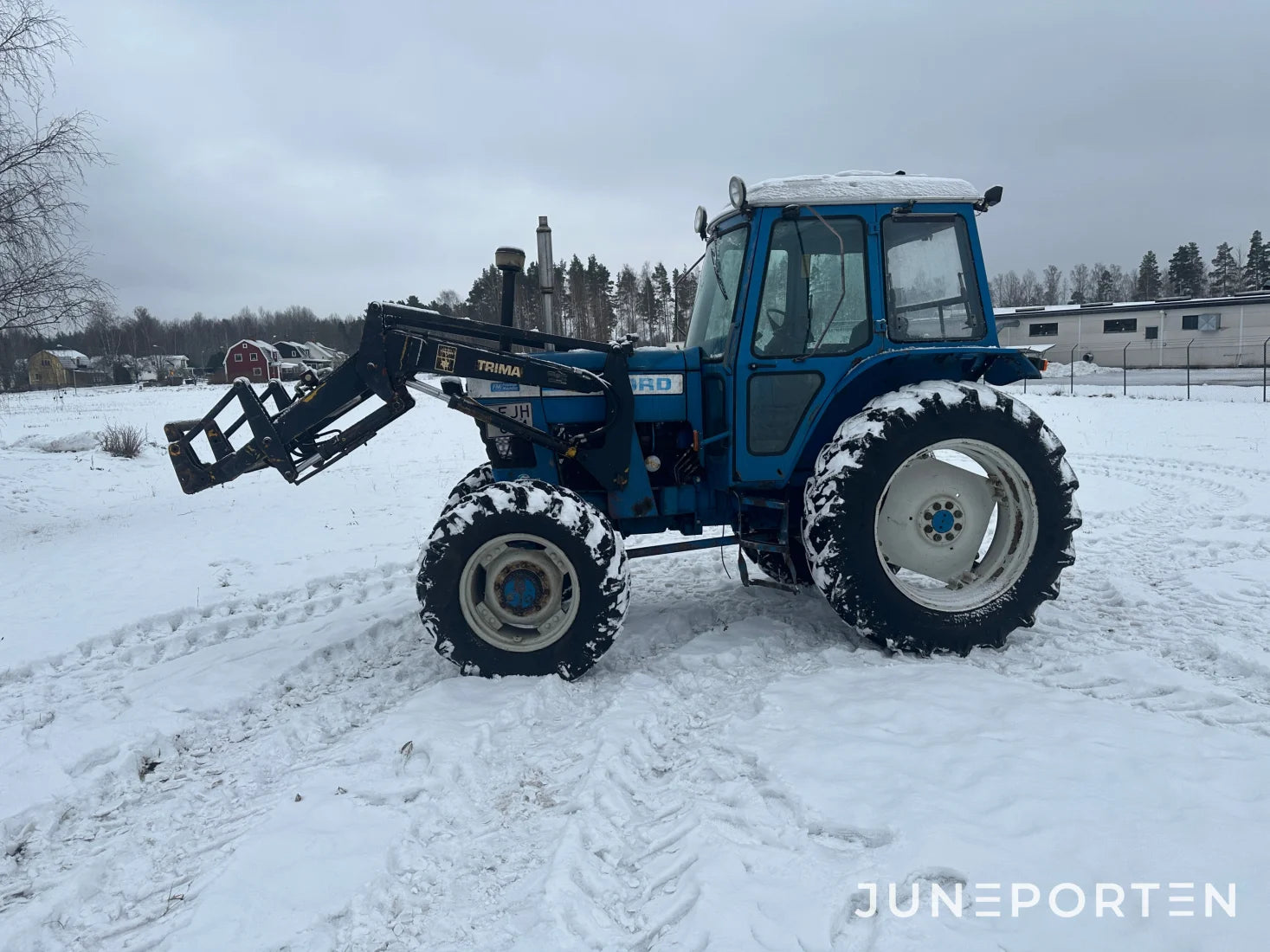 Ford 7700 med trima lastare