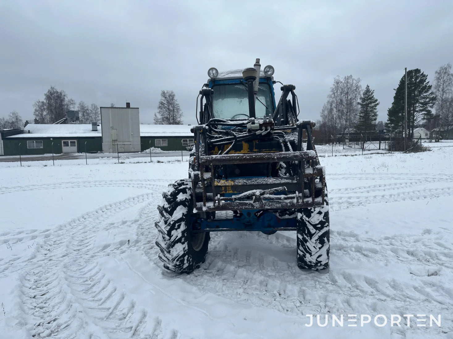 Ford 7700 med trima lastare