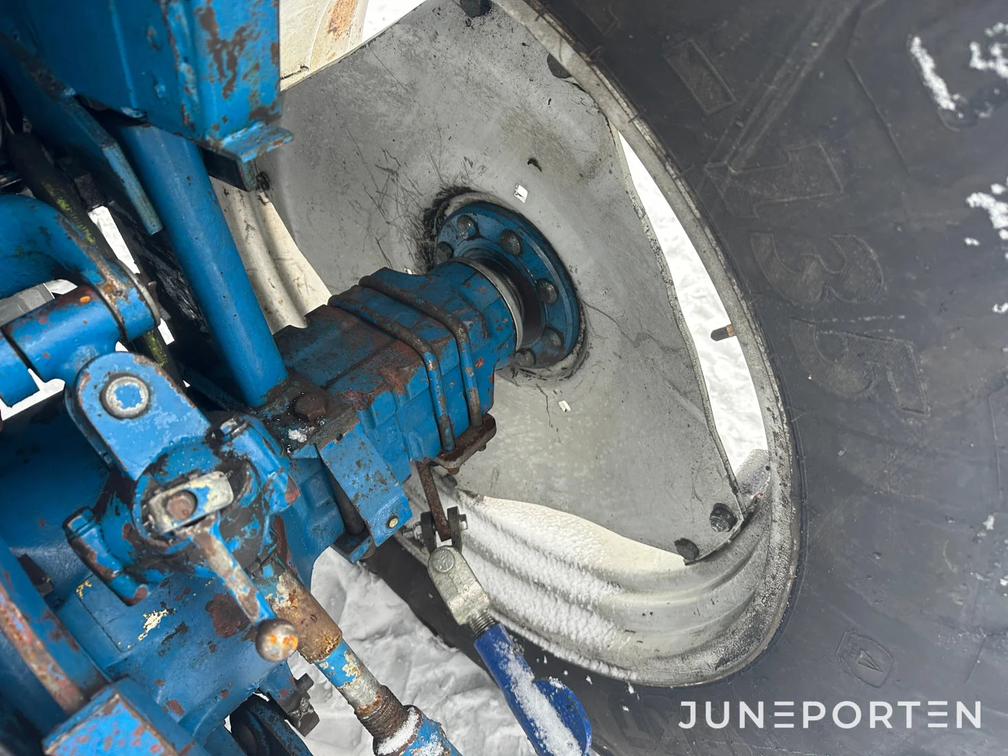 Ford 7700 med trima lastare