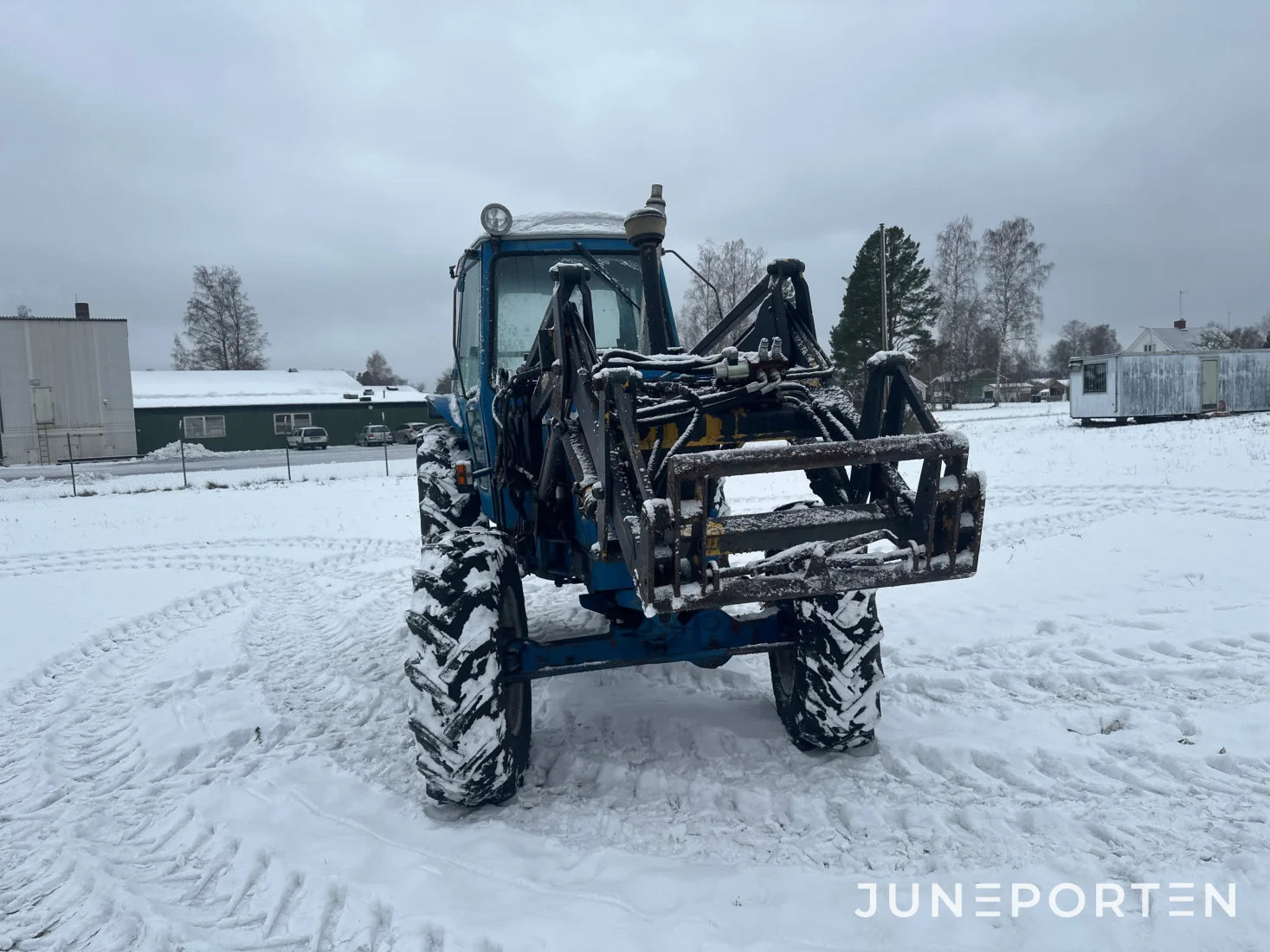 Ford 7700 med trima lastare