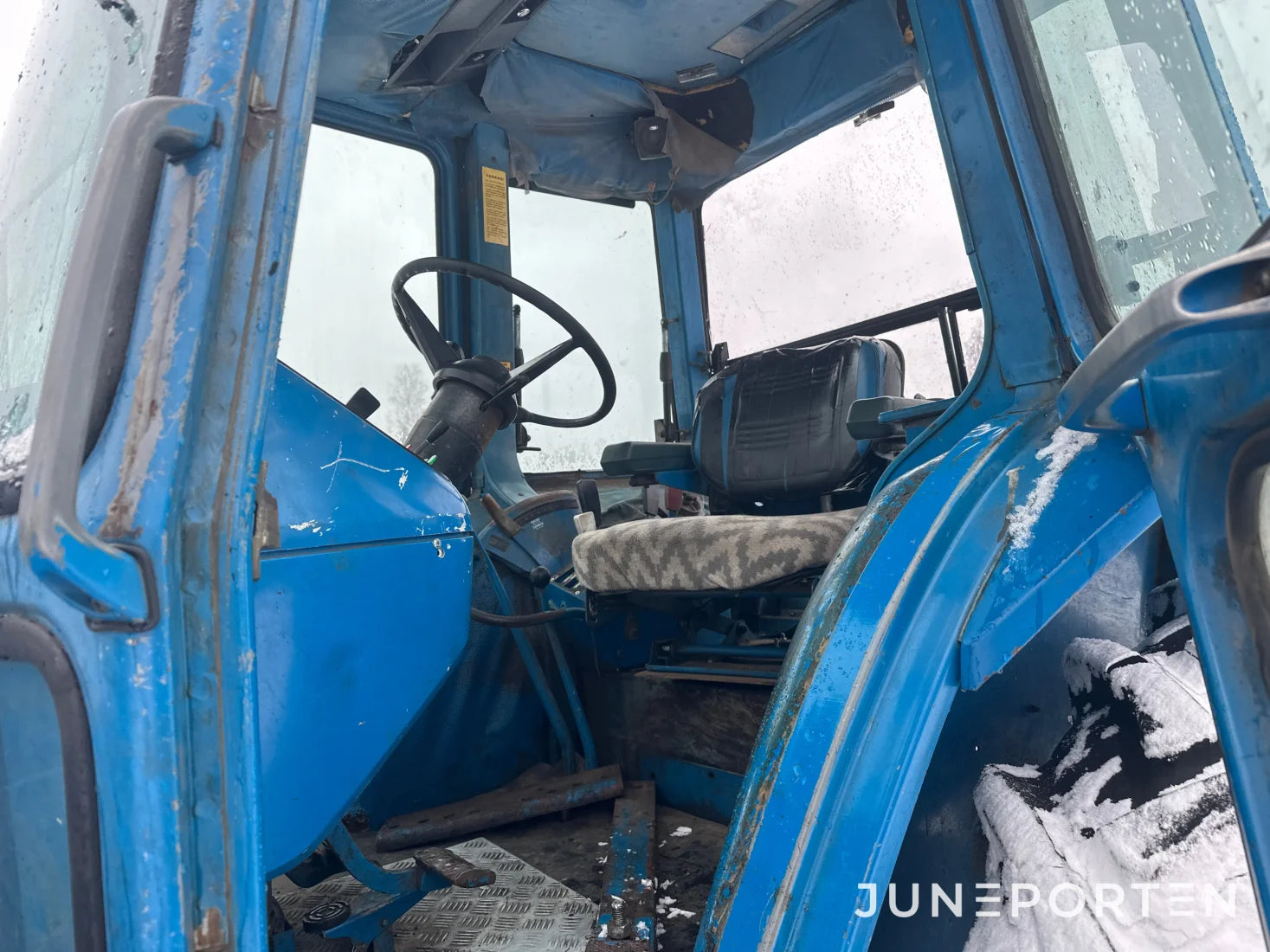 Ford 7700 med trima lastare