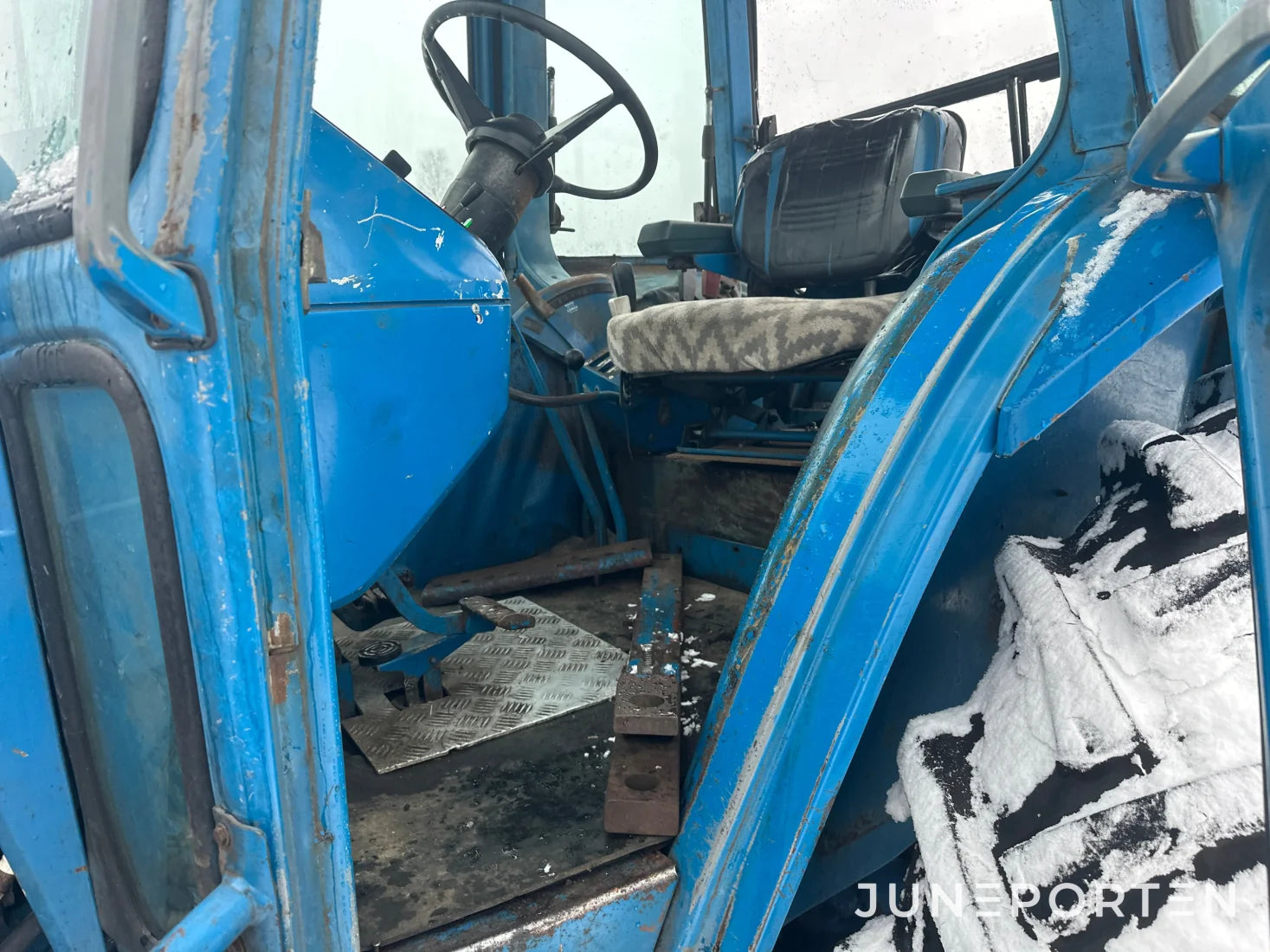 Ford 7700 med trima lastare