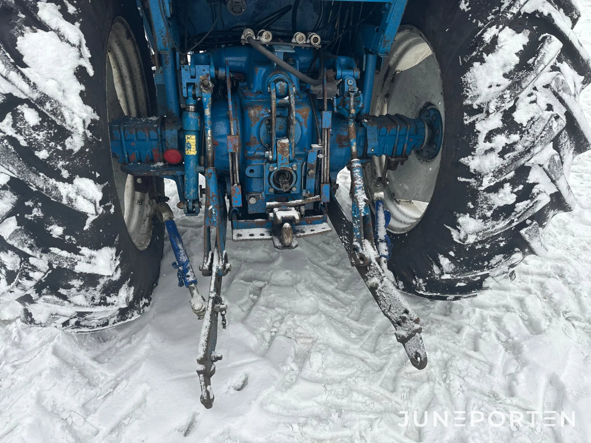 Ford 7700 med trima lastare