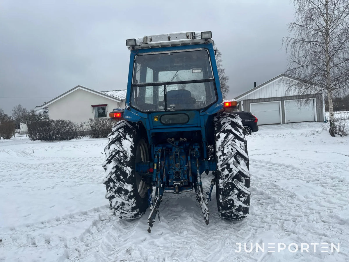 Ford 7700 med trima lastare