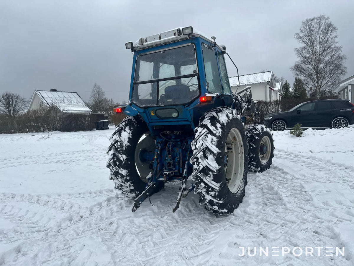 Ford 7700 med trima lastare