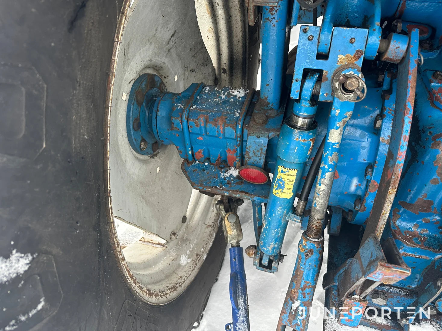 Ford 7700 med trima lastare