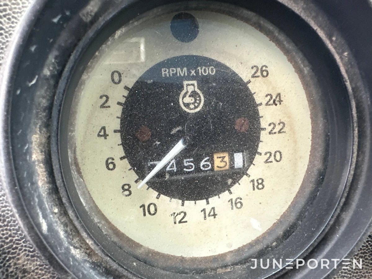 Ford 7700 med trima lastare