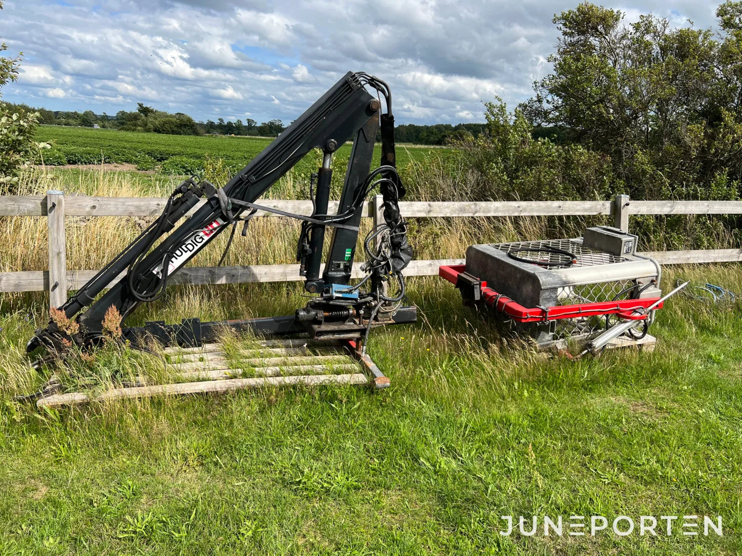 Huddig kran med korg