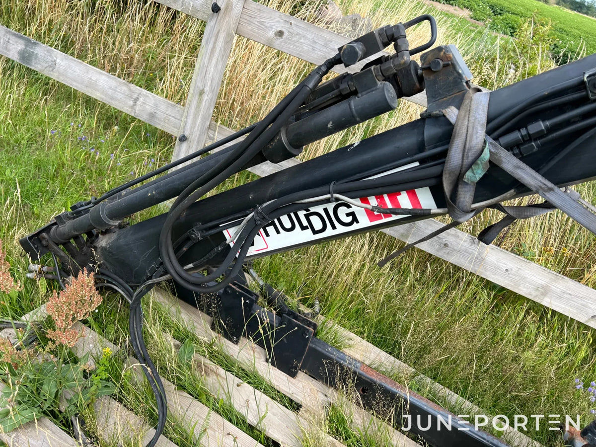 Huddig kran med korg