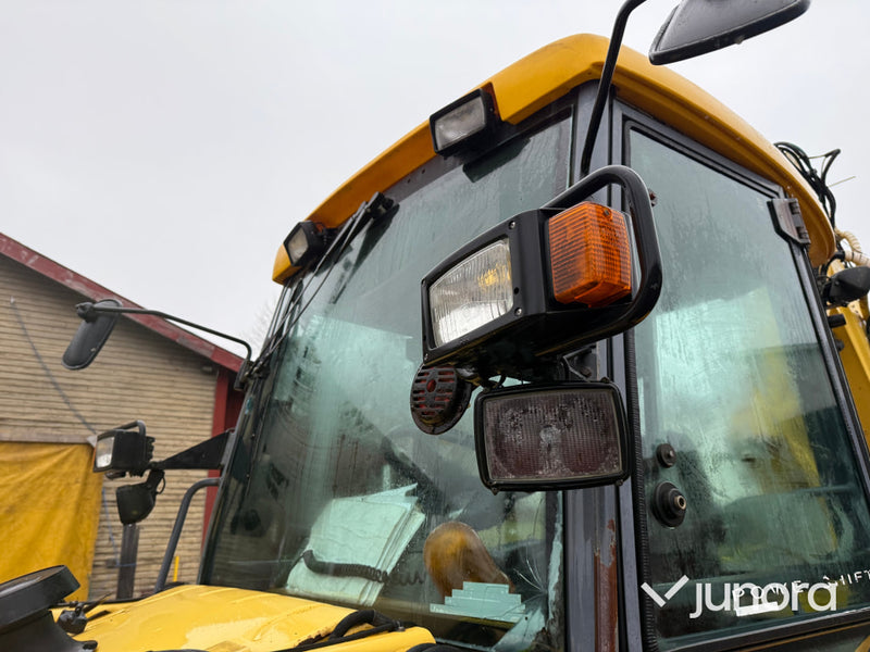 Traktorgrävare - New Holland LB115