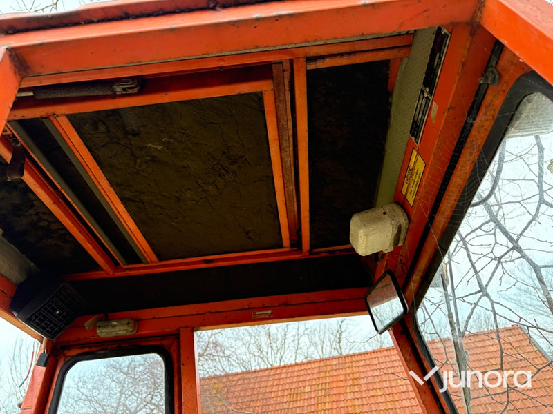 Traktorgrävare - Belos