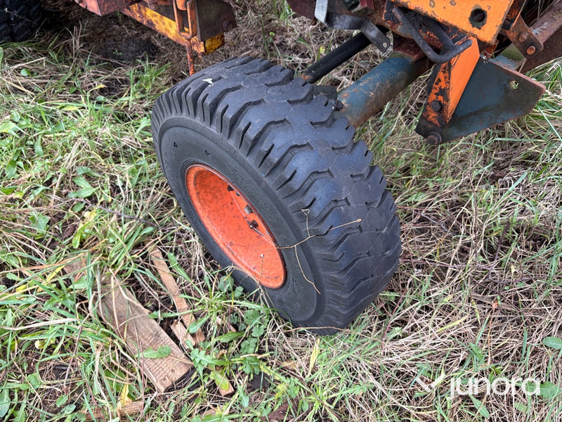 Traktorgrävare - Belos