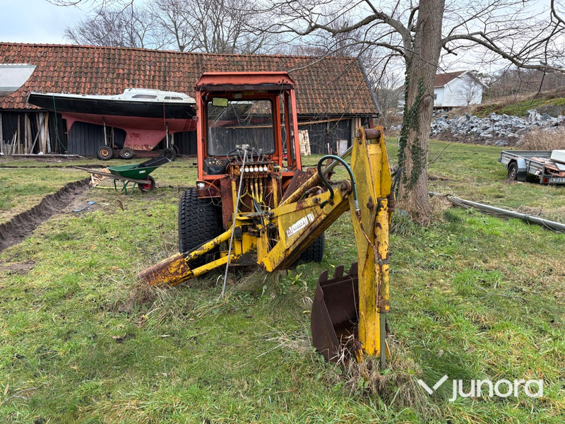 Traktorgrävare - Belos