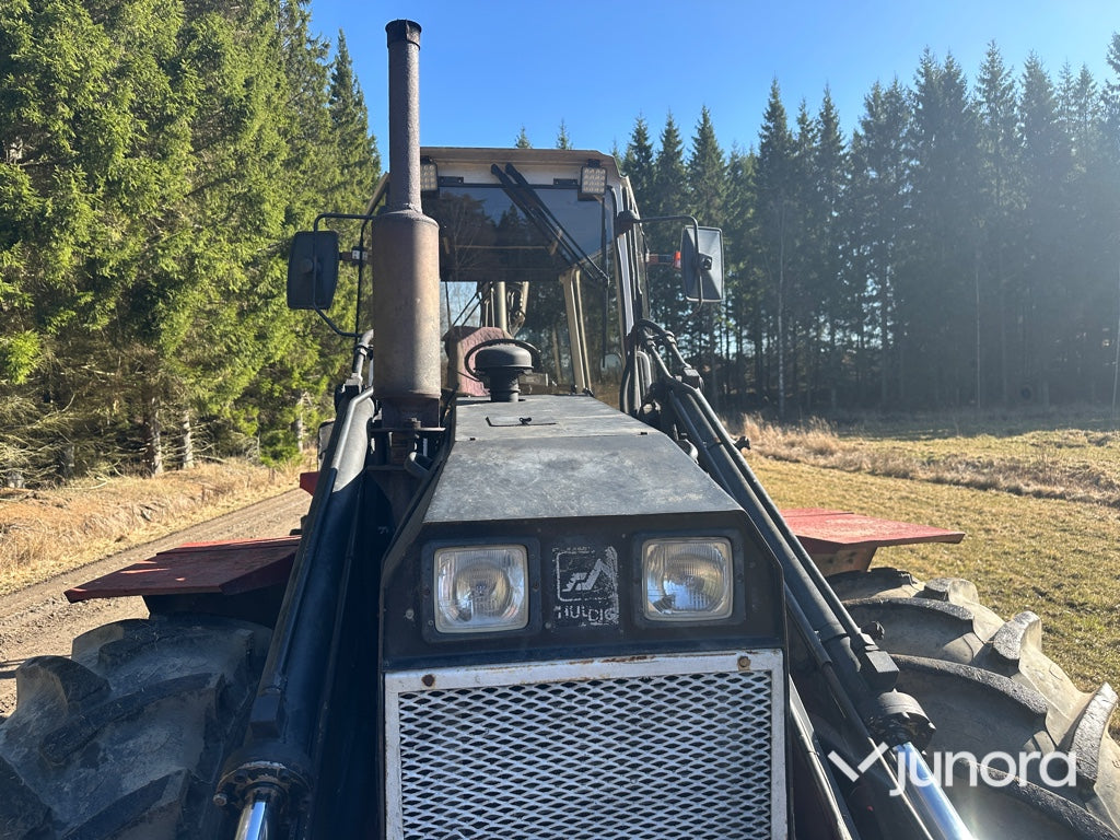 Traktorgrävare - Huddig, 760