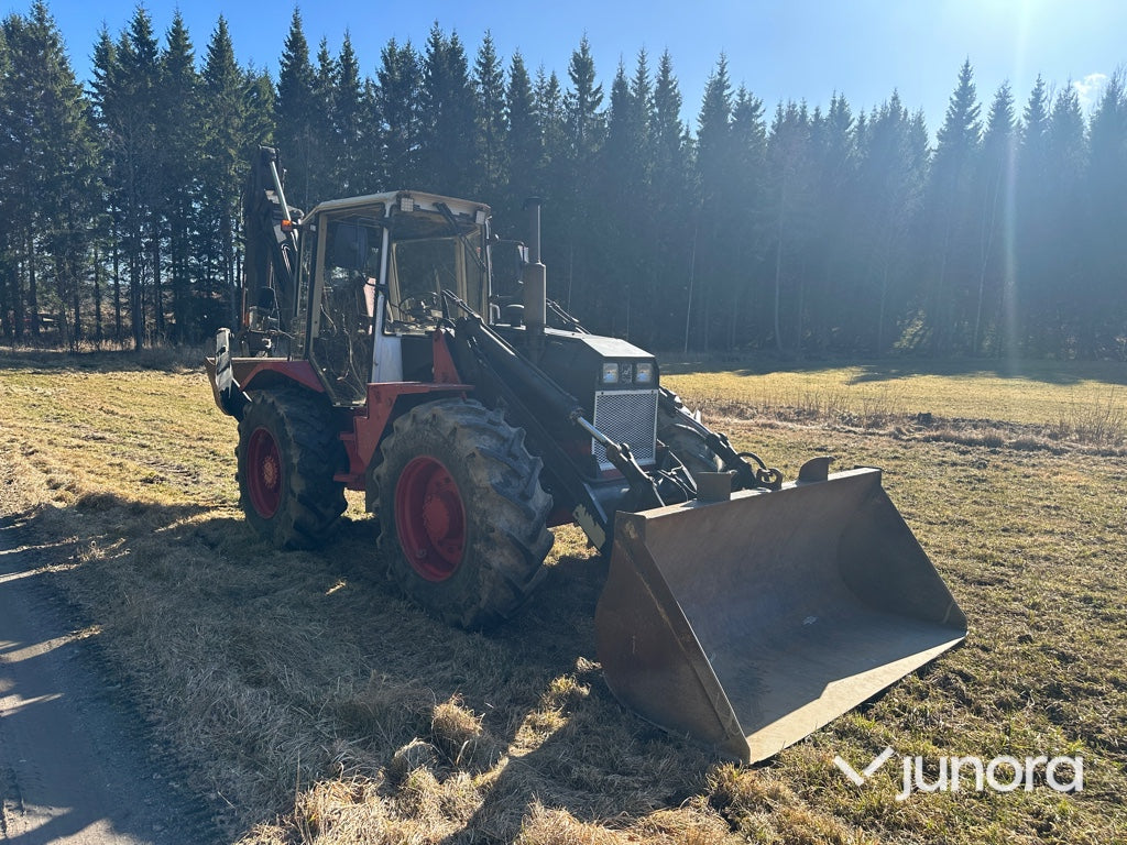 Traktorgrävare - Huddig, 760