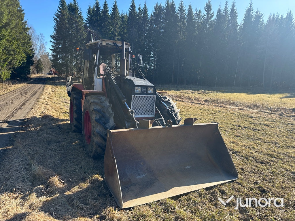 Traktorgrävare - Huddig, 760