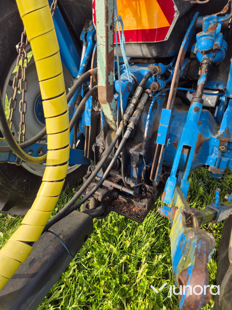 Traktor med timmervagn - Ford, 7600