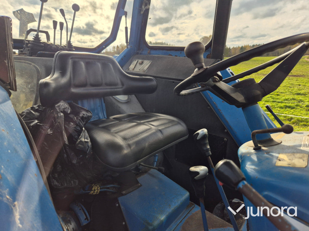 Traktor med timmervagn - Ford, 7600