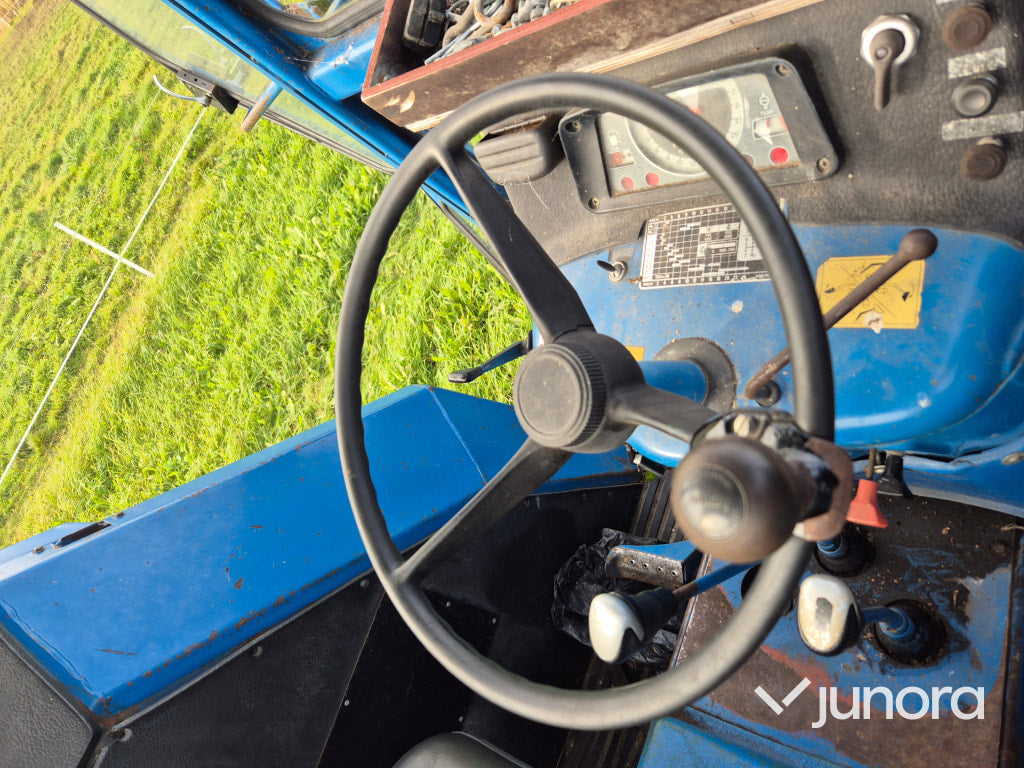 Traktor med timmervagn - Ford, 7600