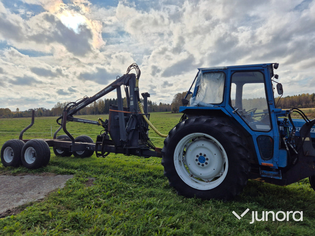 Traktor med timmervagn - Ford, 7600