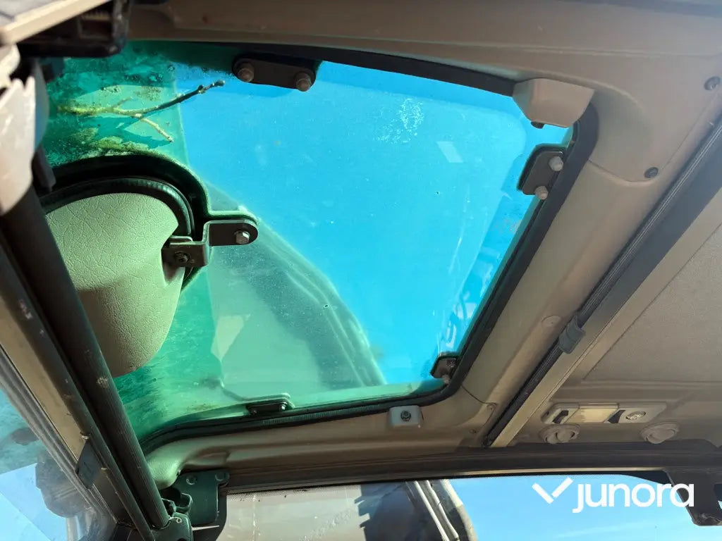 Grävmaskin Volvo EC210CL med tiltrotator och redskap