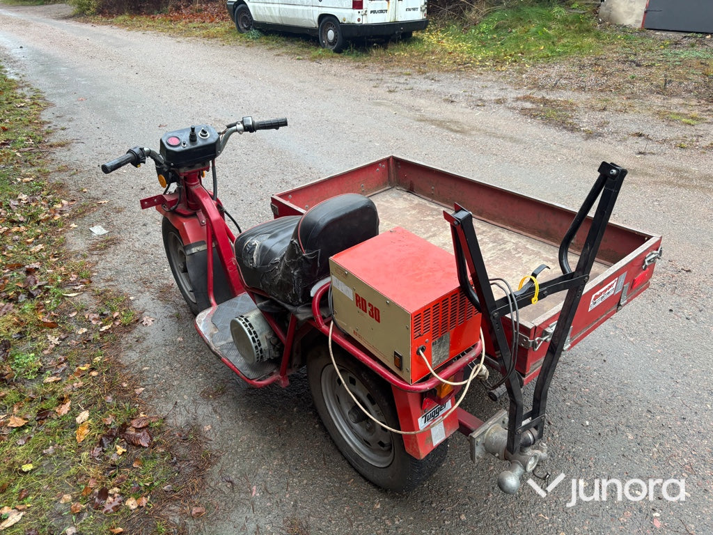 Flakmoped El - Tugger