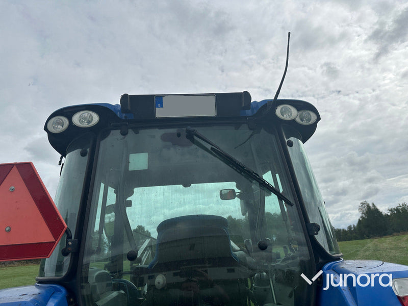 New Holland T5. 95 med vreten lastare