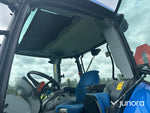 New Holland T5. 95 med vreten lastare