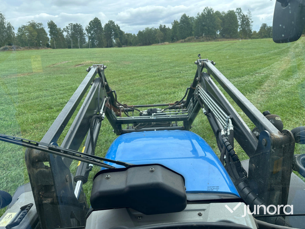 New Holland T5. 95 med vreten lastare