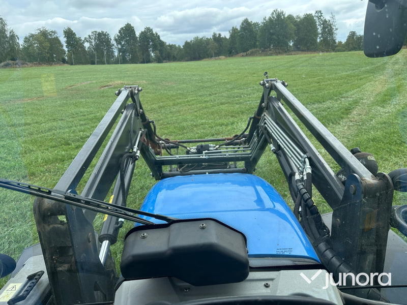 New Holland T5. 95 med vreten lastare