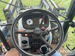 New Holland T5. 95 med vreten lastare
