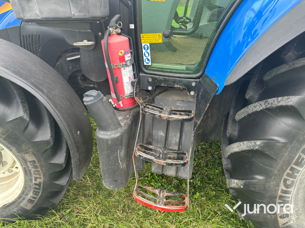 New Holland T5. 95 med vreten lastare