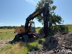 Åkerman hjulgrävare med tiltrotator & redskap