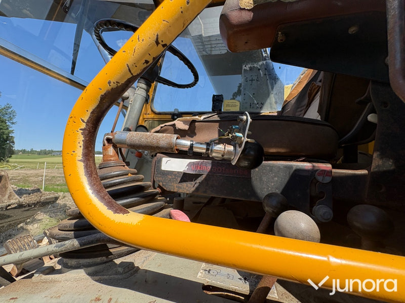 Åkerman hjulgrävare med tiltrotator & redskap